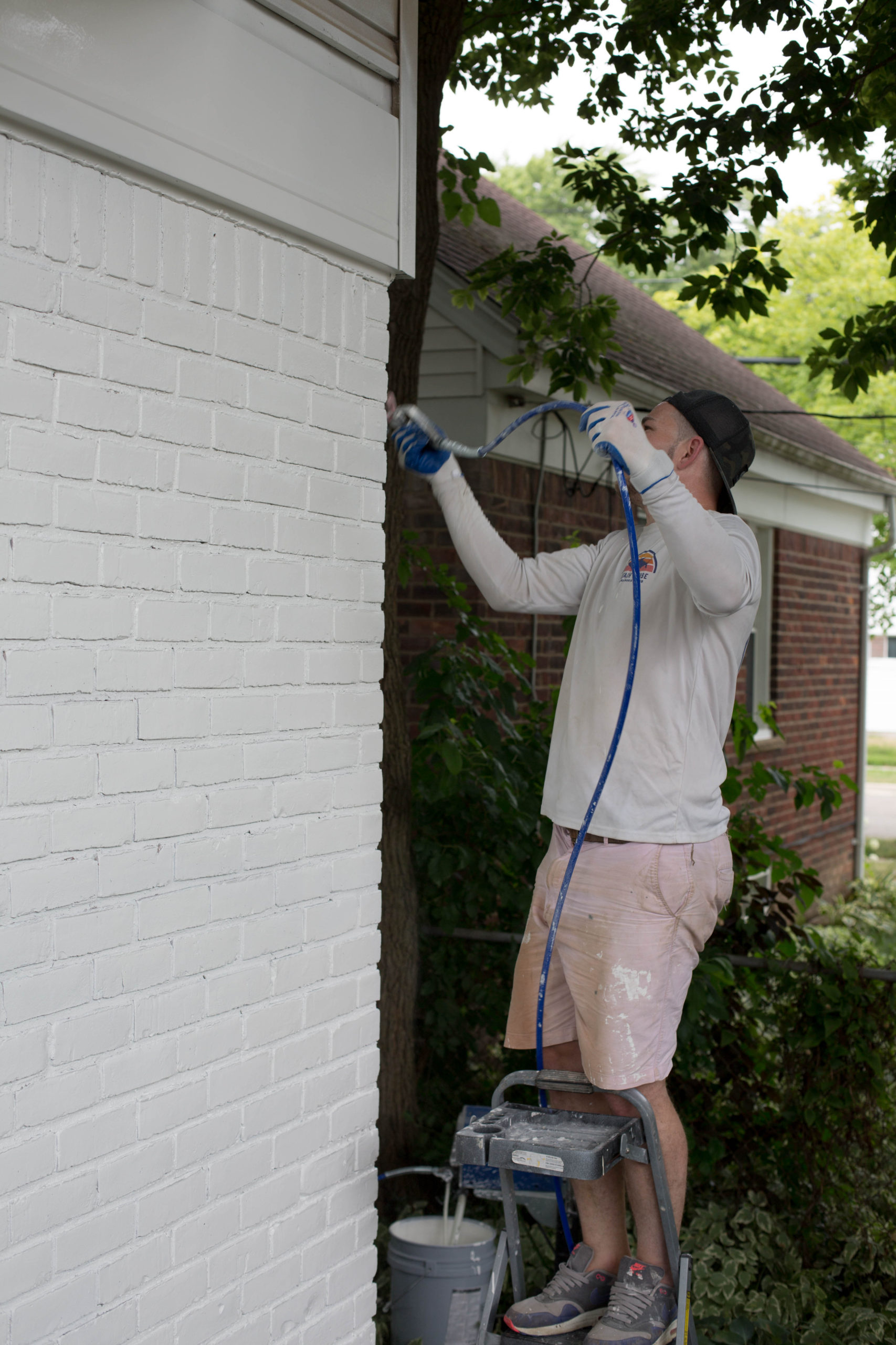 DIY how to paint brick and vinyl siding